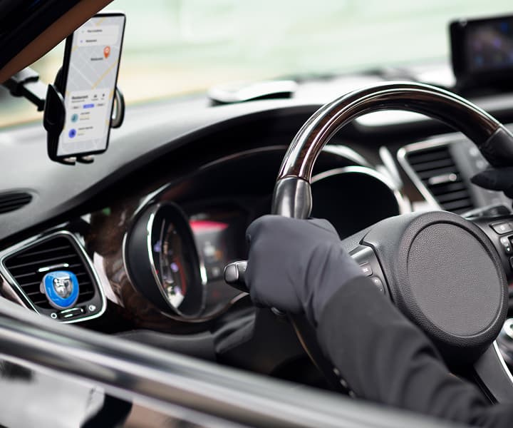 driver behind the wheel of a car